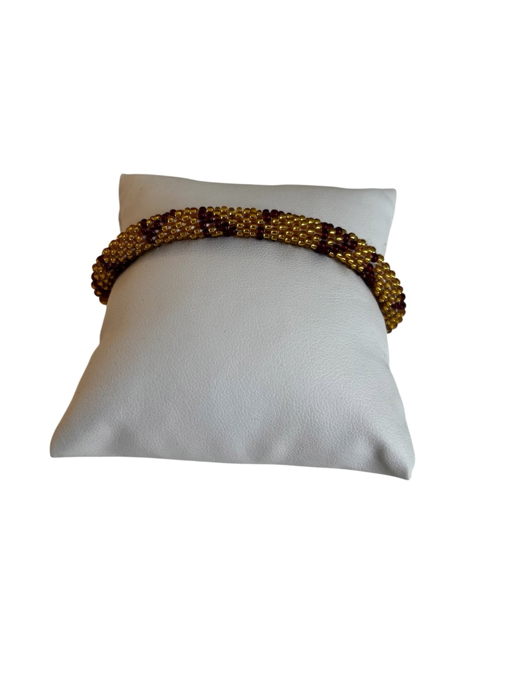 Aid Through Trade Hand Crocheted Roll-On Bracelet in Gold & Burgundy Pattern.